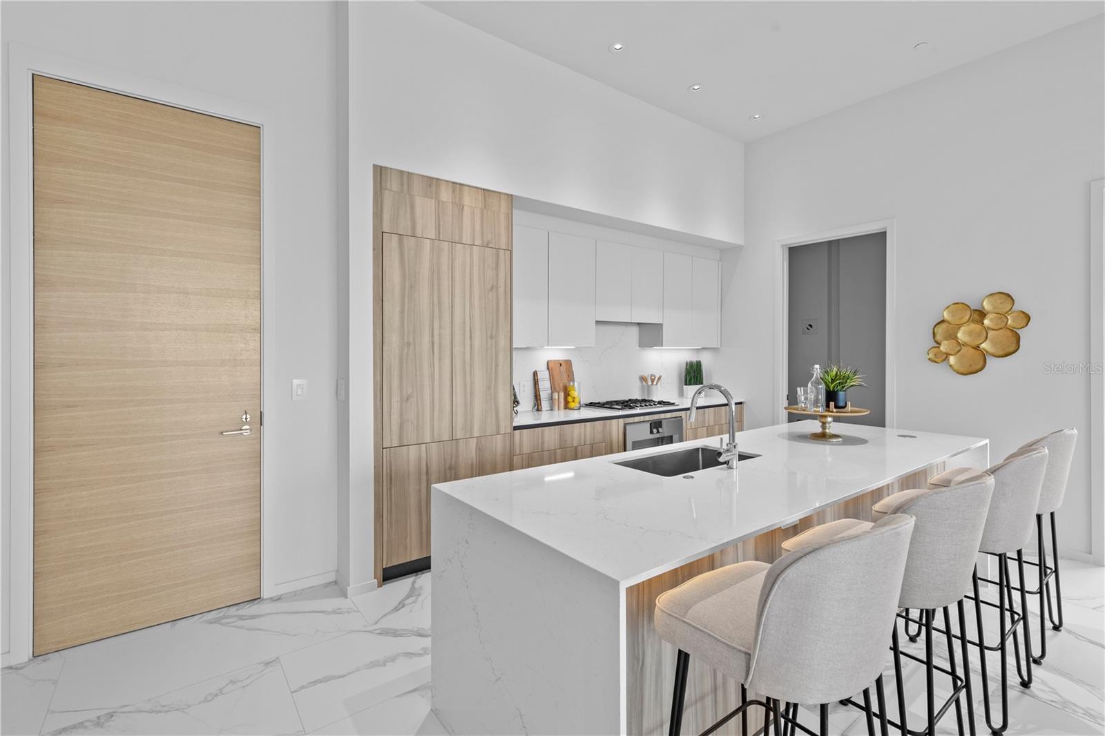 Kitchen and breakfast bar