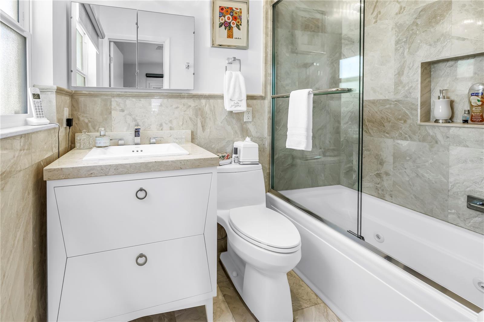 Updated ensuite guest bathroom.