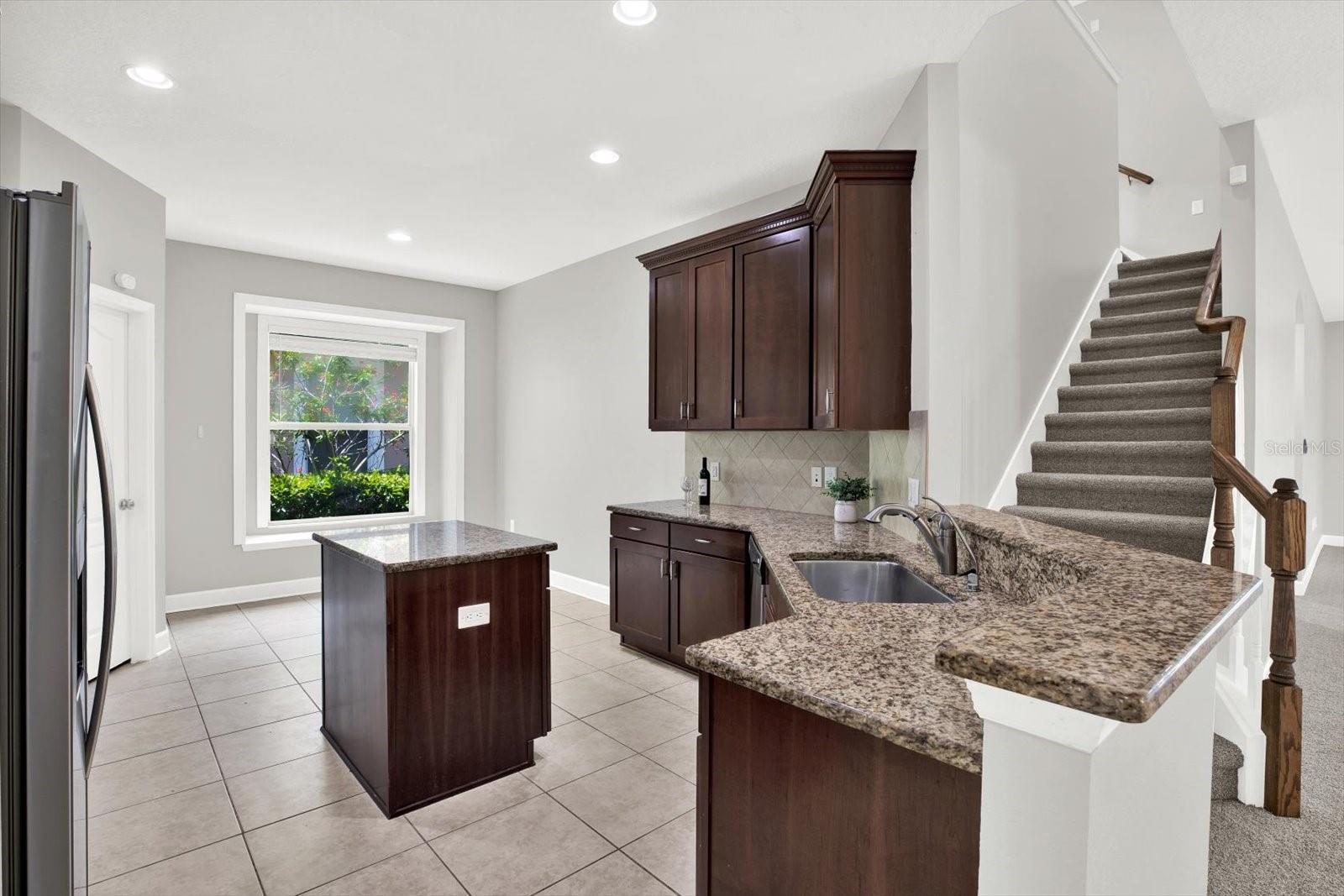 Spacious kitchen with granite counters