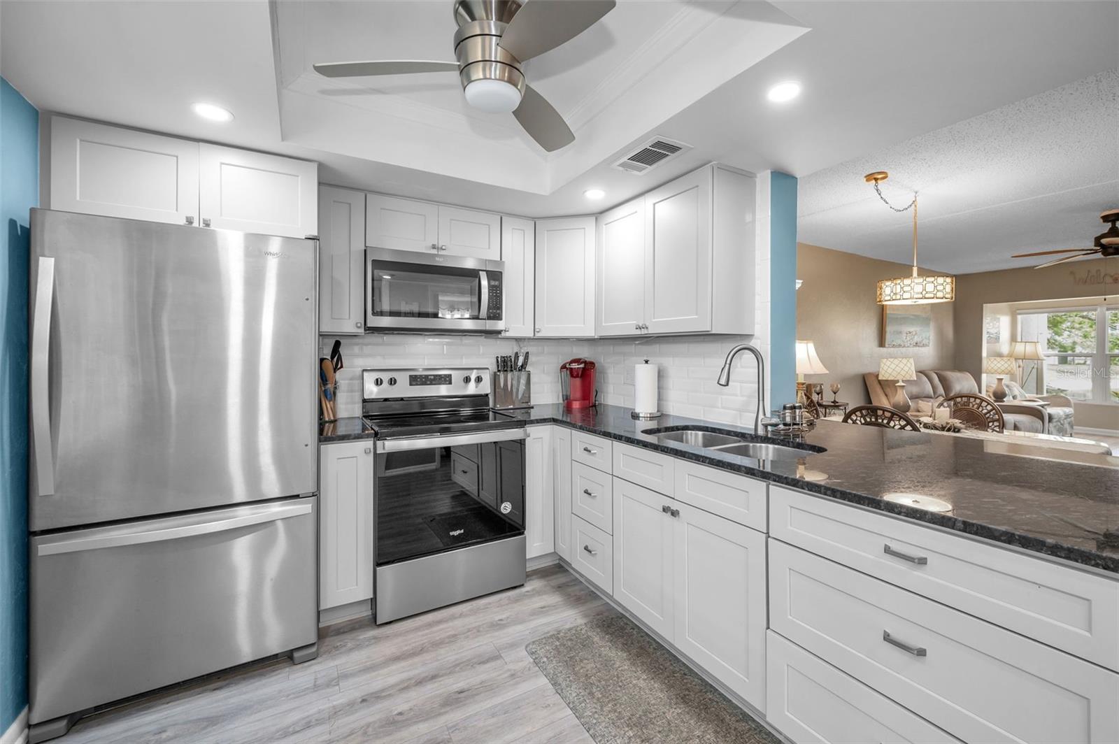 Open Floor Plan, Full Size Fridge, Built in Microwave and Fan - All of these items are updates and non-existent in the original floorplans.