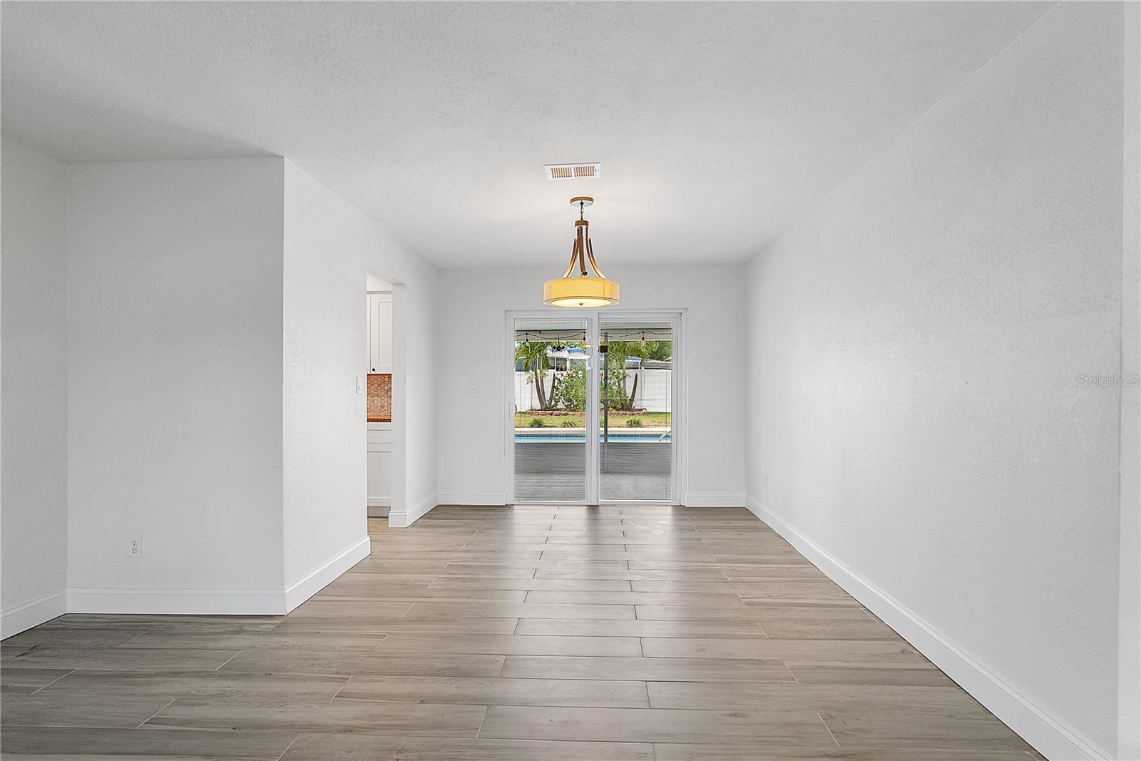 Dinning room-Kitchen is the opening to the left.