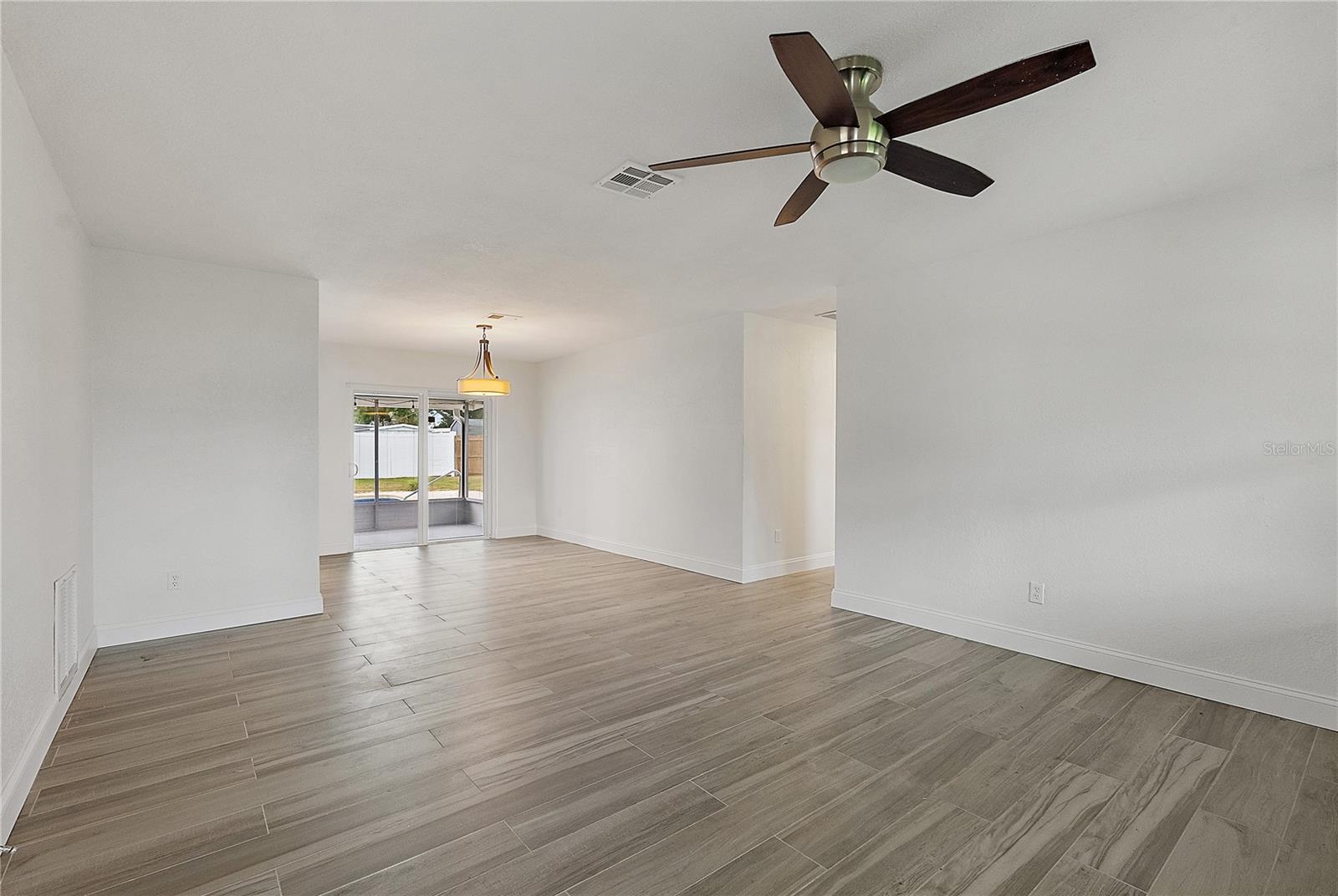 Hallway on right takes you to the Master and second bedroom.