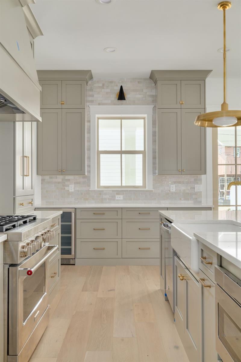 Enameled Cast Iron Undermount Farmhouse Kitchen Sink. This photo is a different model, similar finishes will be provided.