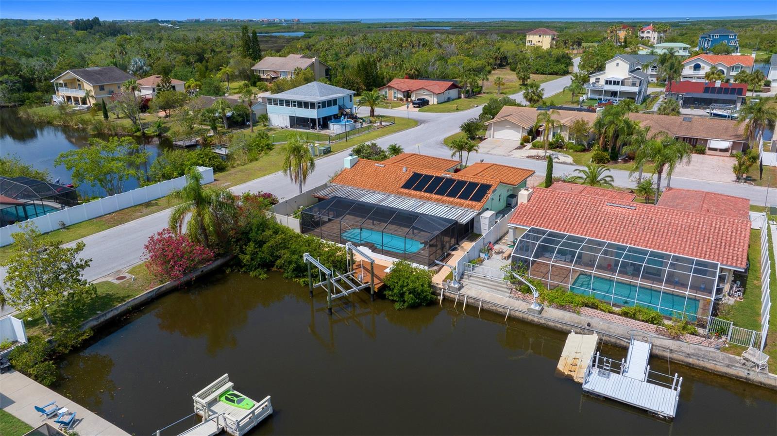 Aerial Rear of home and canal