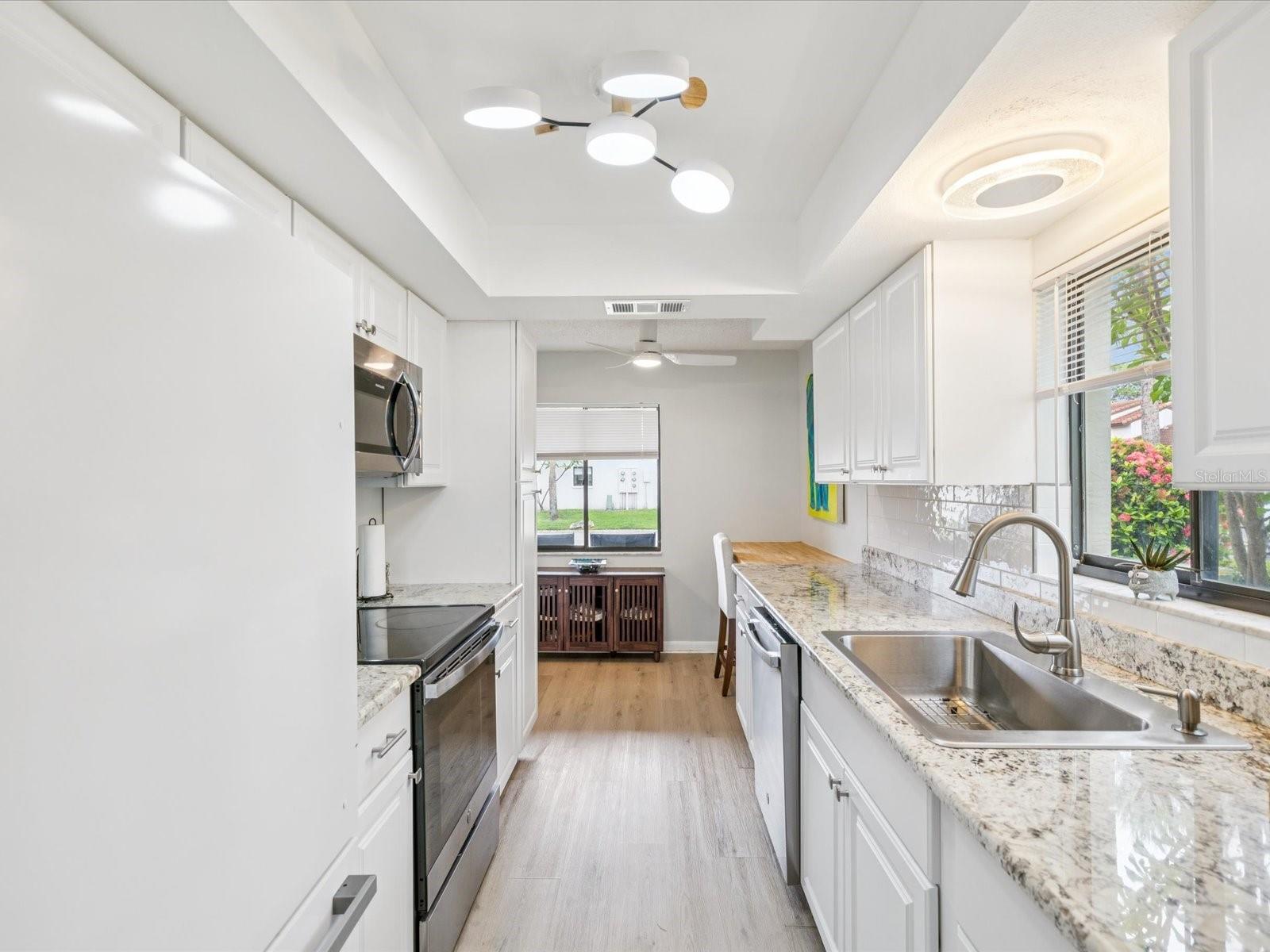 Bright, White Cabinets, Granite Counters