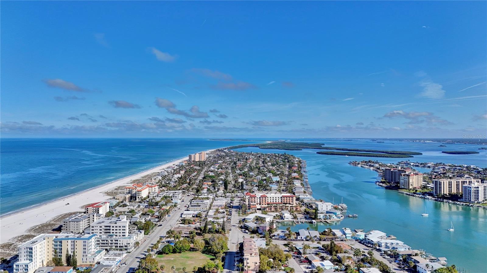 Clearwater Beach looking north, with views of Honeymoon island and Caladisi in the background.