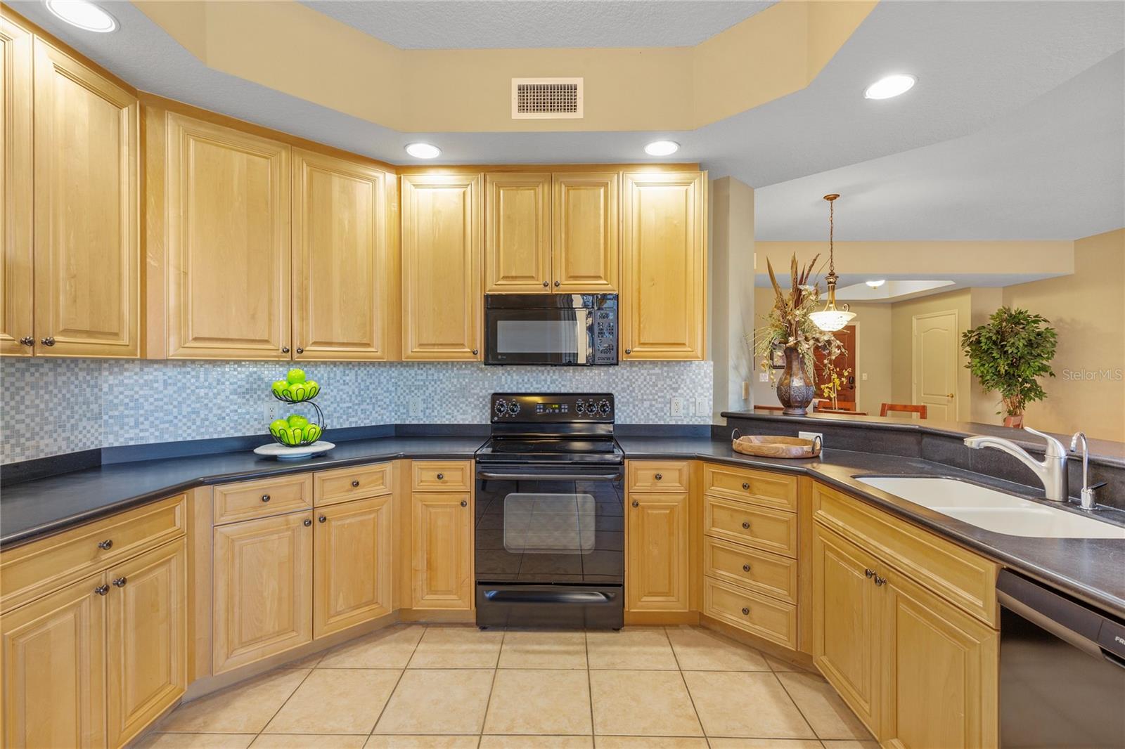 You'll enjoy crafting meals right from the sea in this kitchen with lots of storage and counter space!