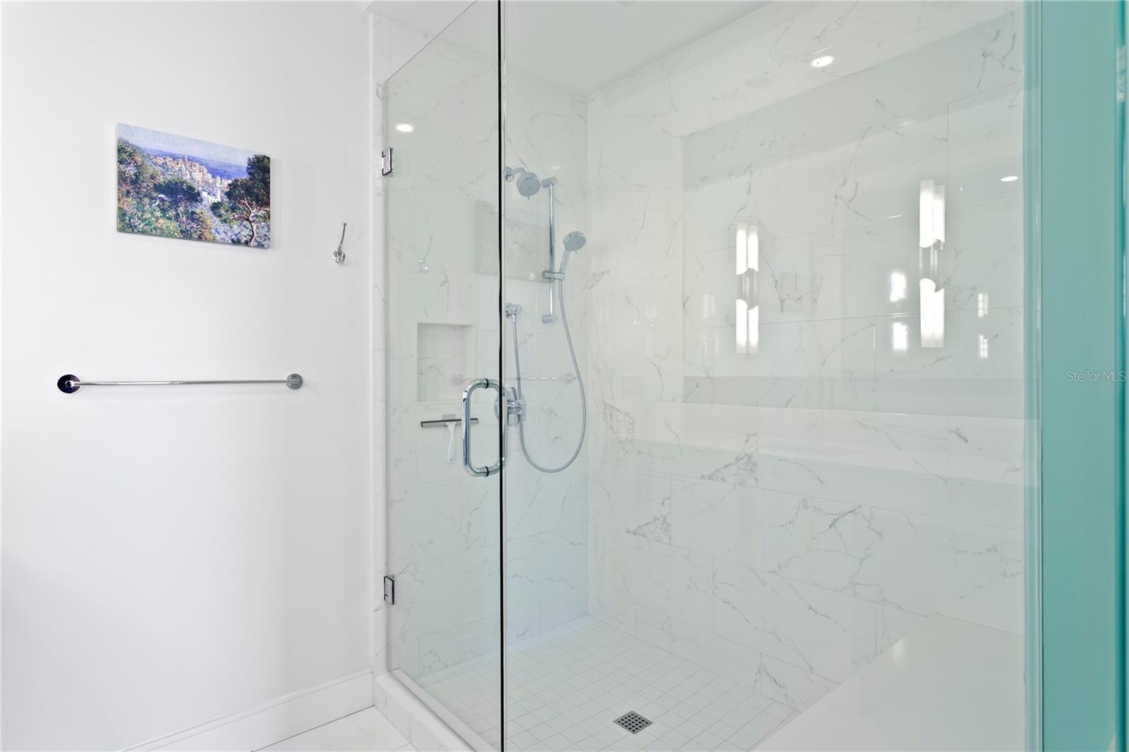 Glass enclosed shower in Primary ensuite