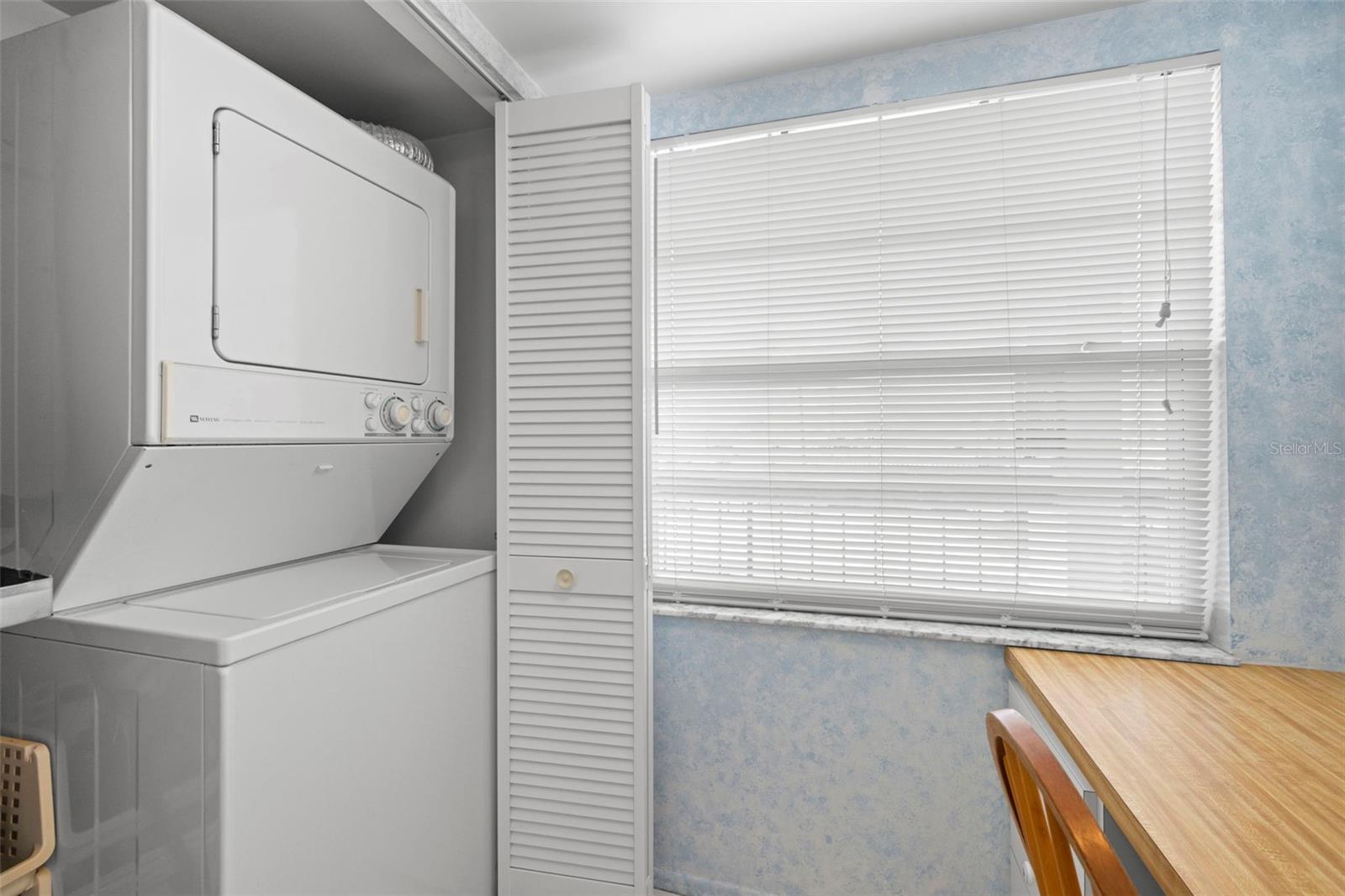 Washer/Dryer is conveniently located in the kitchen.