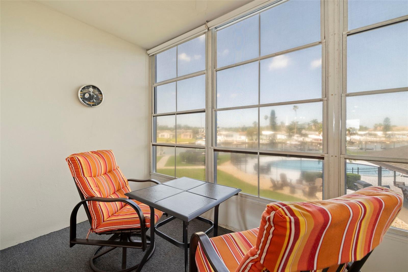 Enclosed lanai with an incredible Gulf & Pool View!