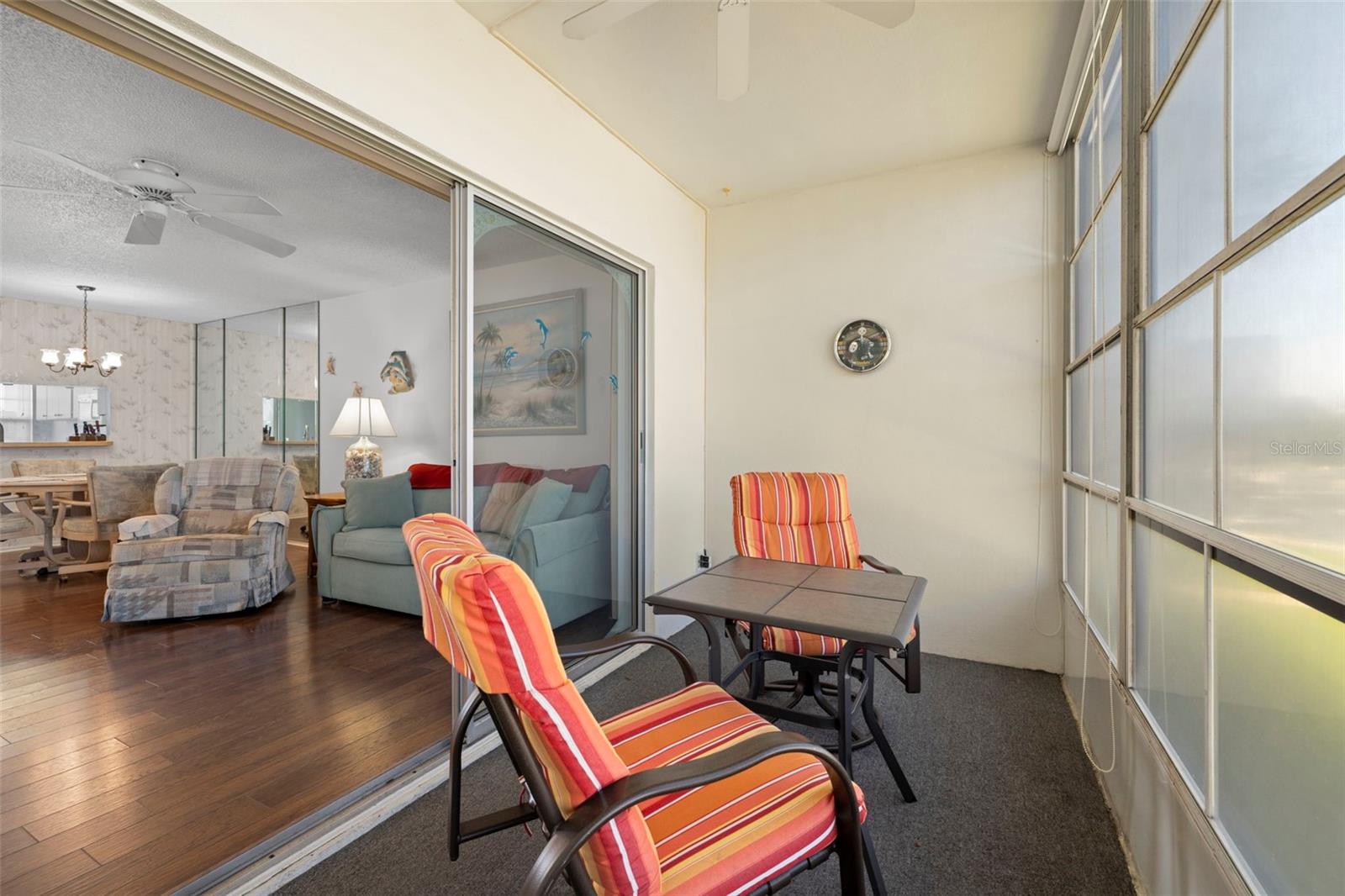 Glass sliders provide easy access to the enclosed lanai!