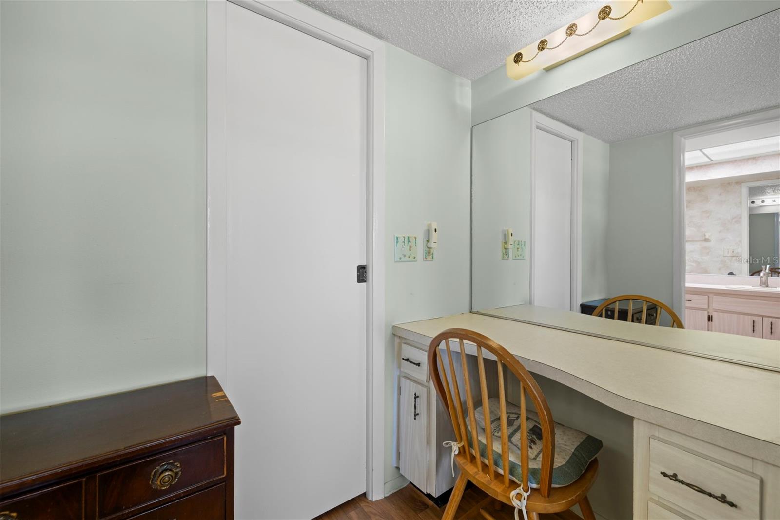 Built-in desk space or make-up vanity in the primary bedroom!