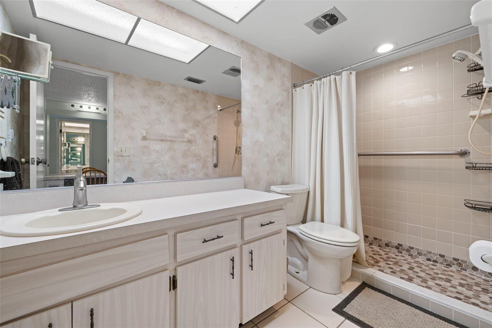Primary bathroom (en-suite) features a large walk-in shower...no tub!