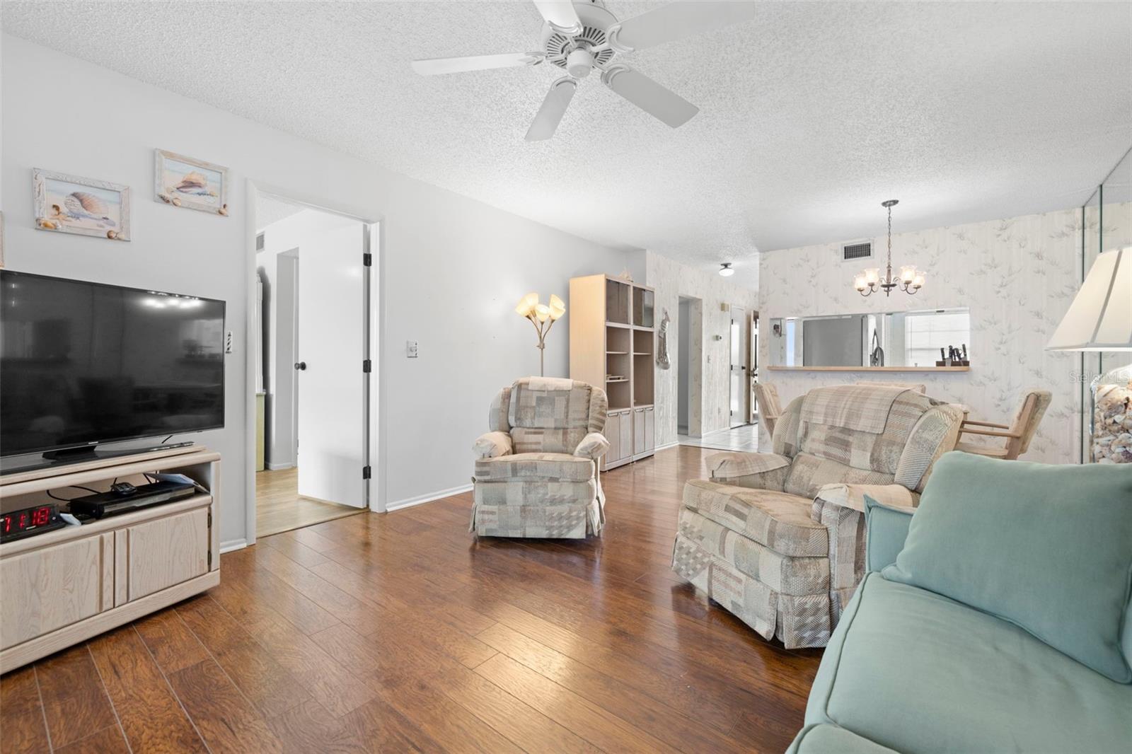 View from living room toward primary bedroom