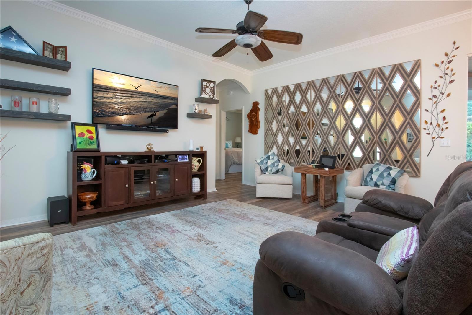 Mirrored wall treatment can be removed to reveal two windows into lanai