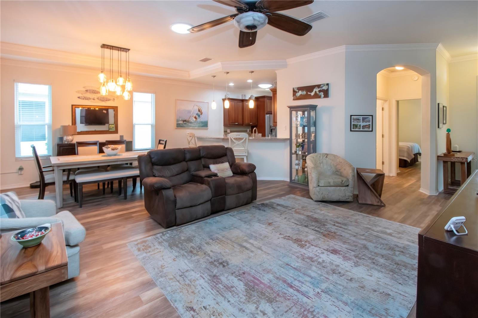 Crown molding throughout the home, plus upgraded lighting and fans