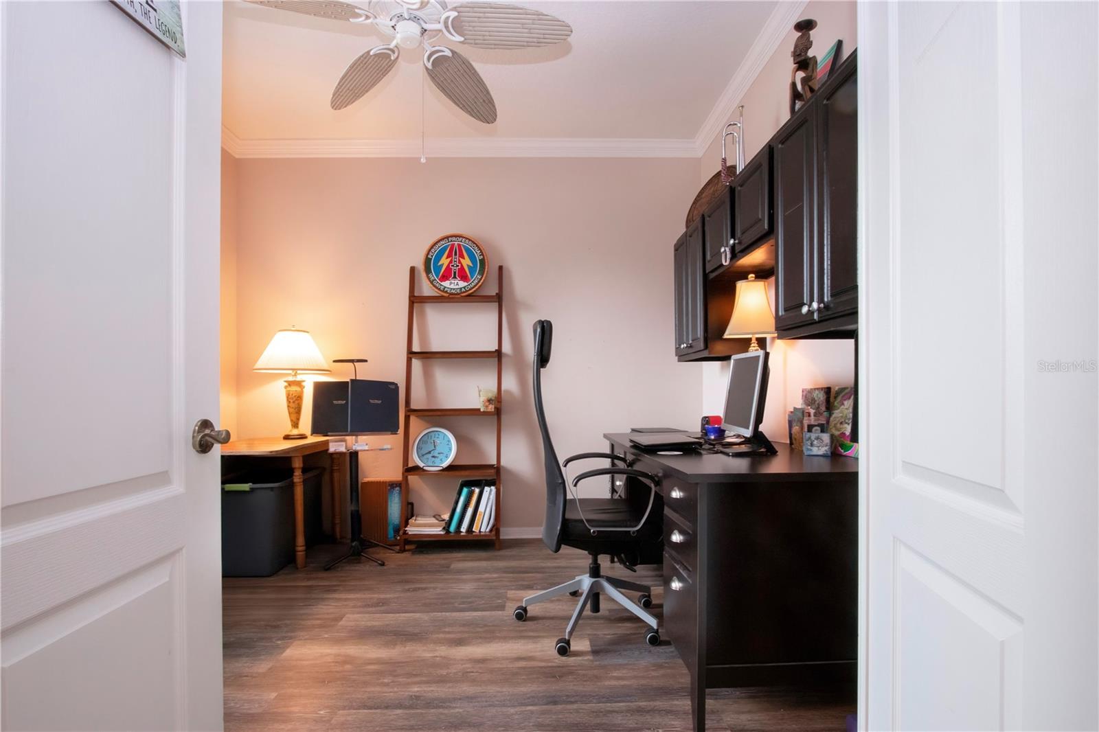 Doubled doors lead into Office/Den