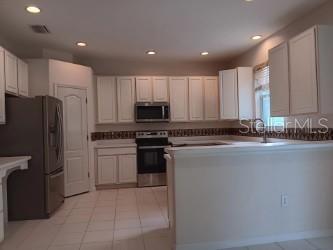 kitchen with new stainless steel appliances