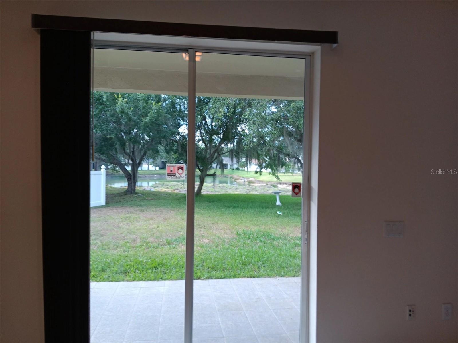 slide door with beautiful custom made blinds