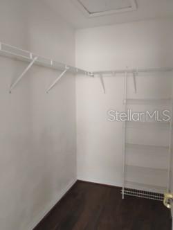 2 walking closets of his in master suite
