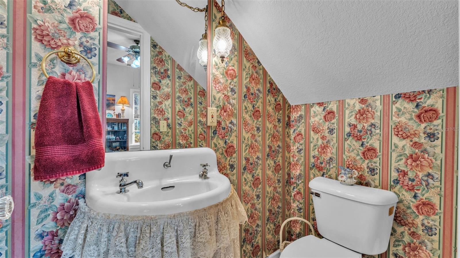 Half bathroom / powder room under the stairs
