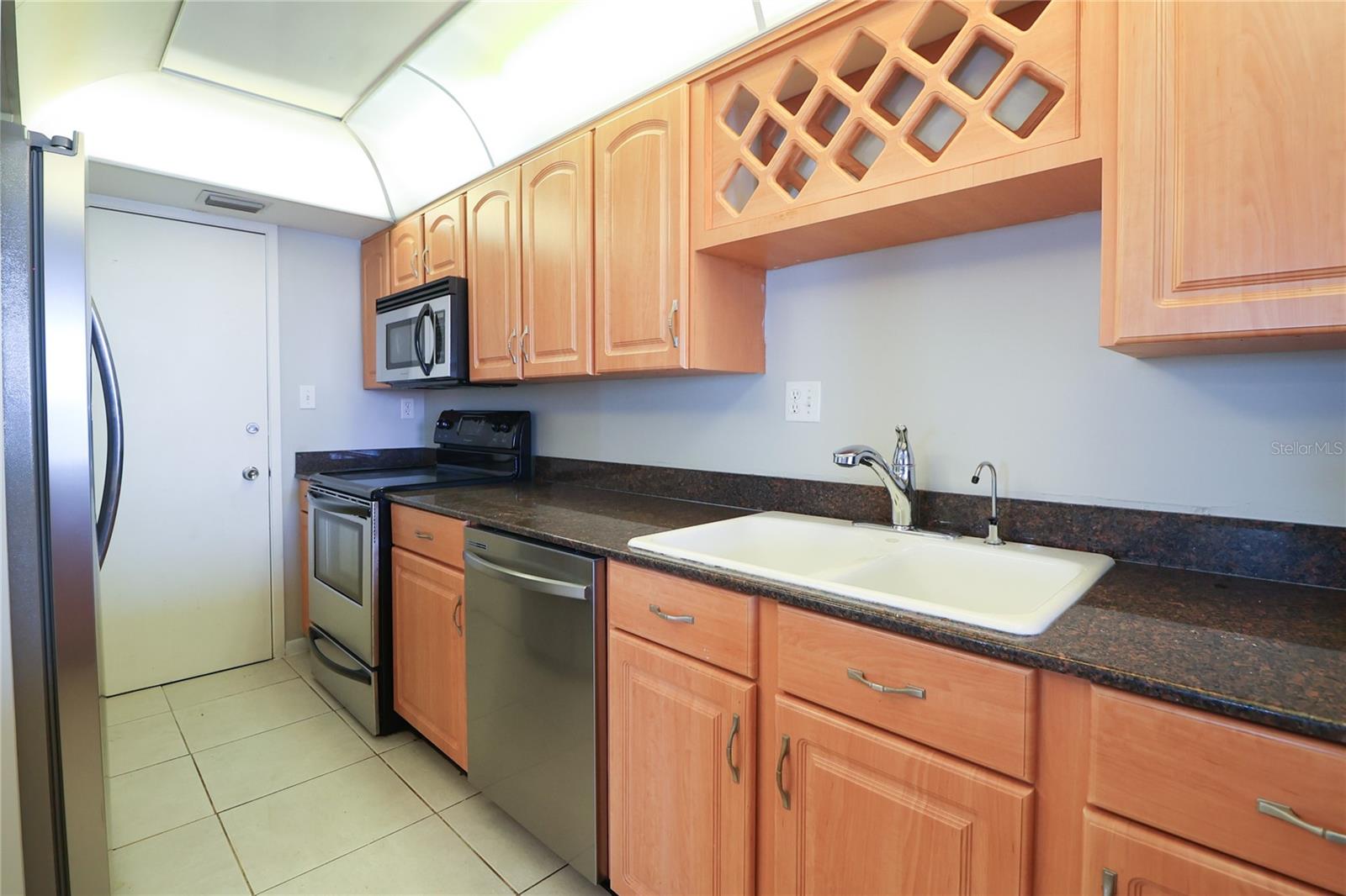 Stone countertops and solid cabinets