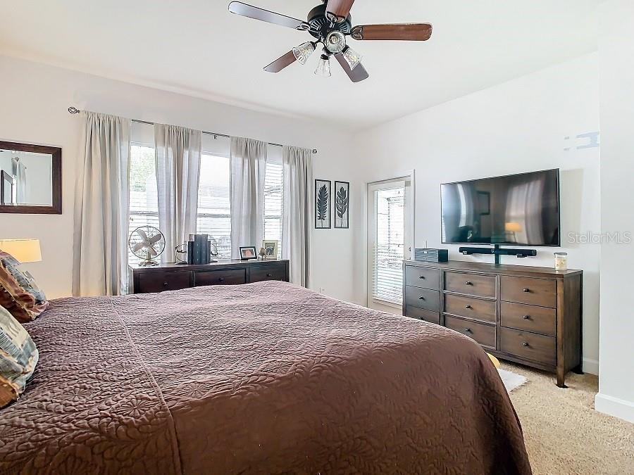Single french door leads to the pool area