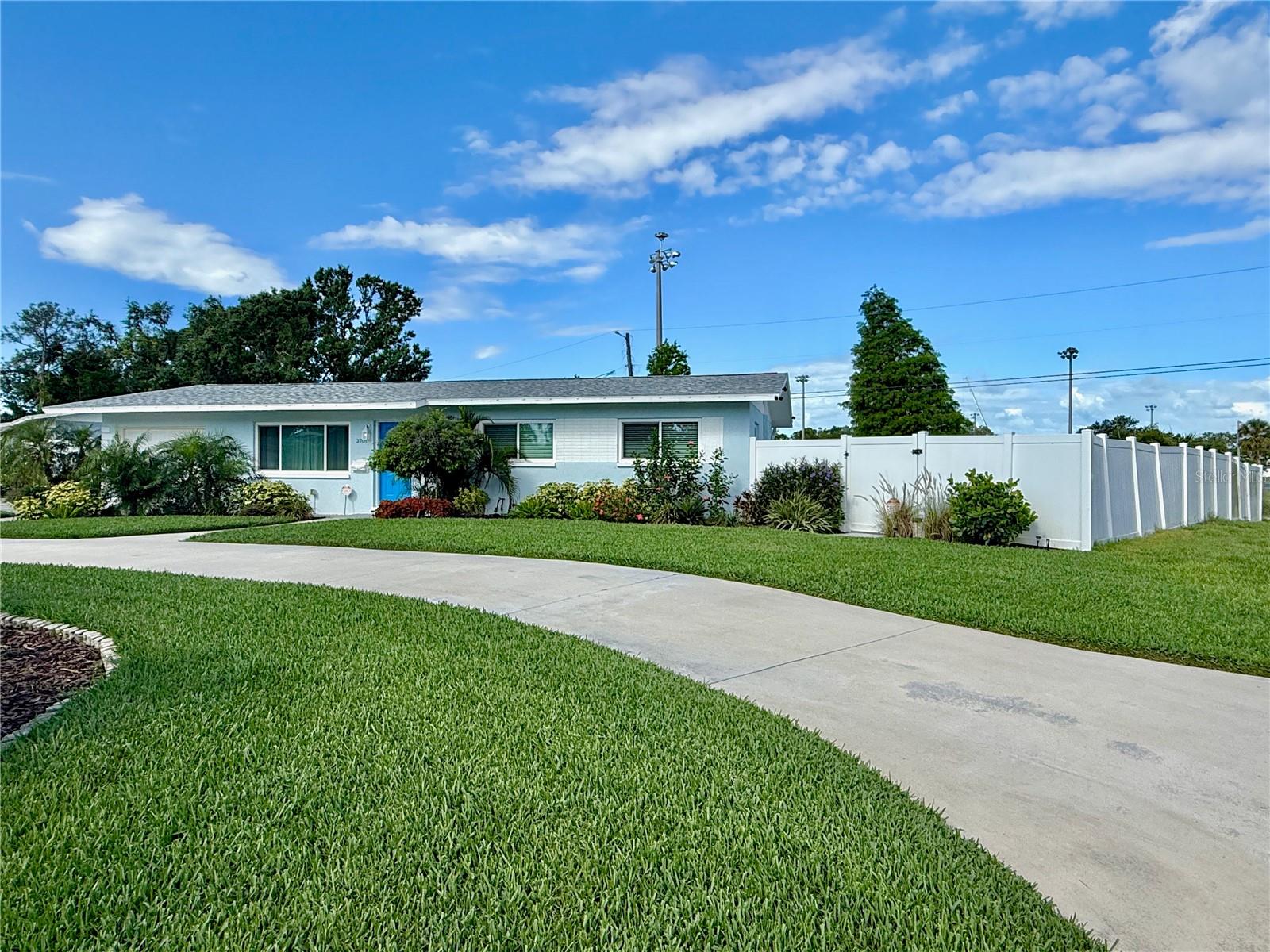 Private corner lot location with right side access to Coquina Key Park.