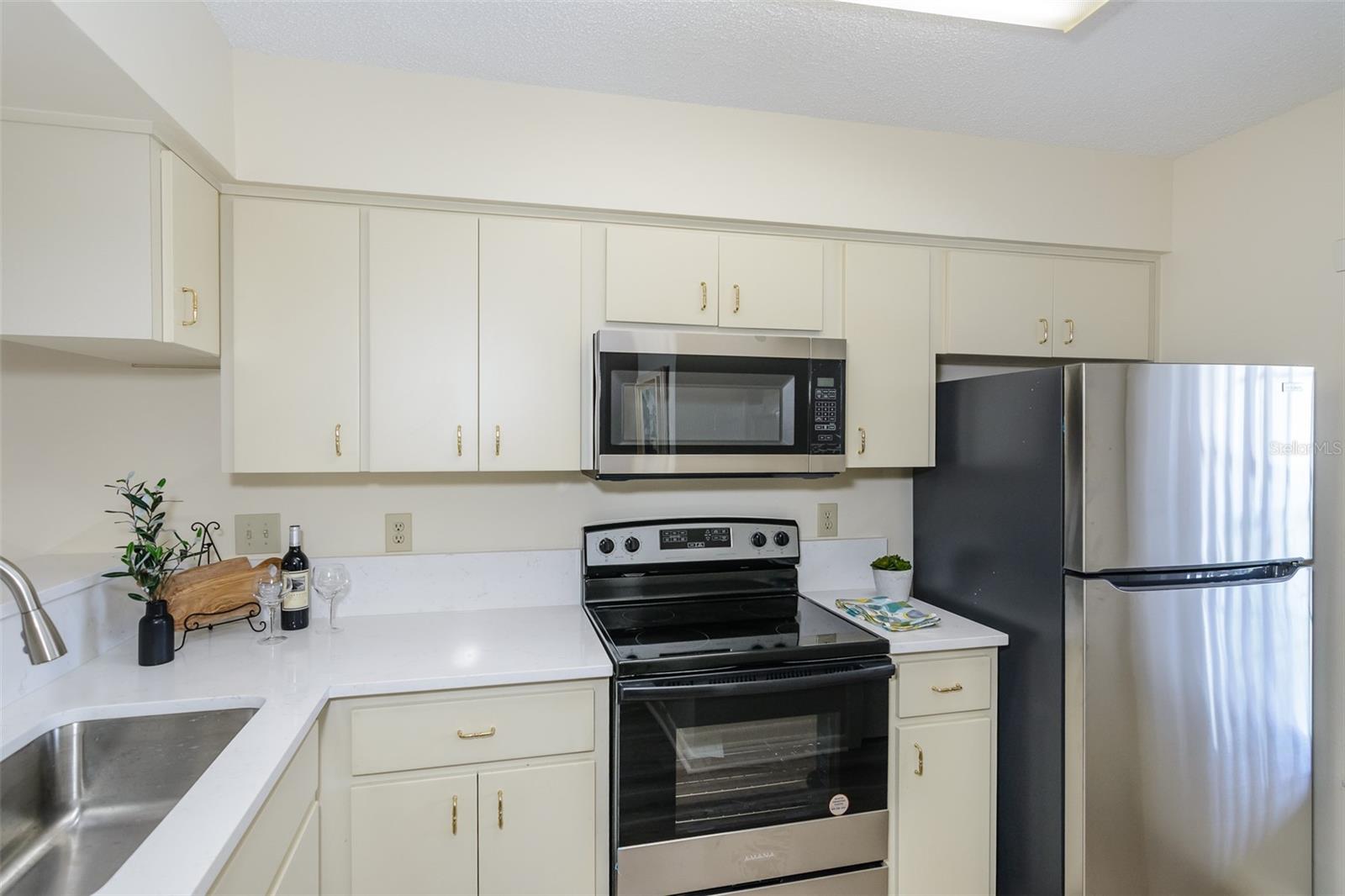 All new appliances and new countertop.  Closet stackable washer and dryer.