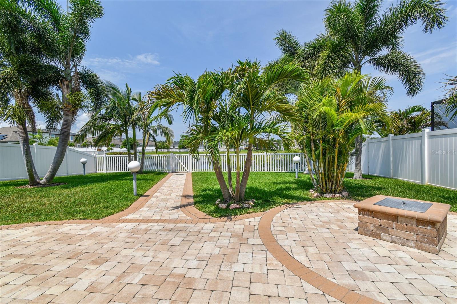 Beautifully Landscaped Backyard and Fire Pit