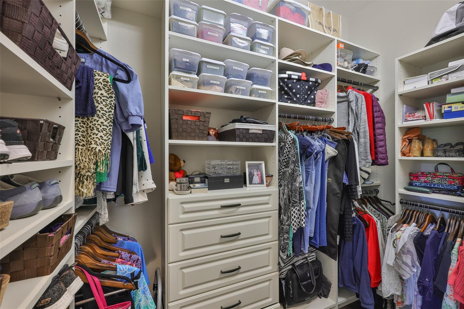 One of Two Customized Walk-In Closets