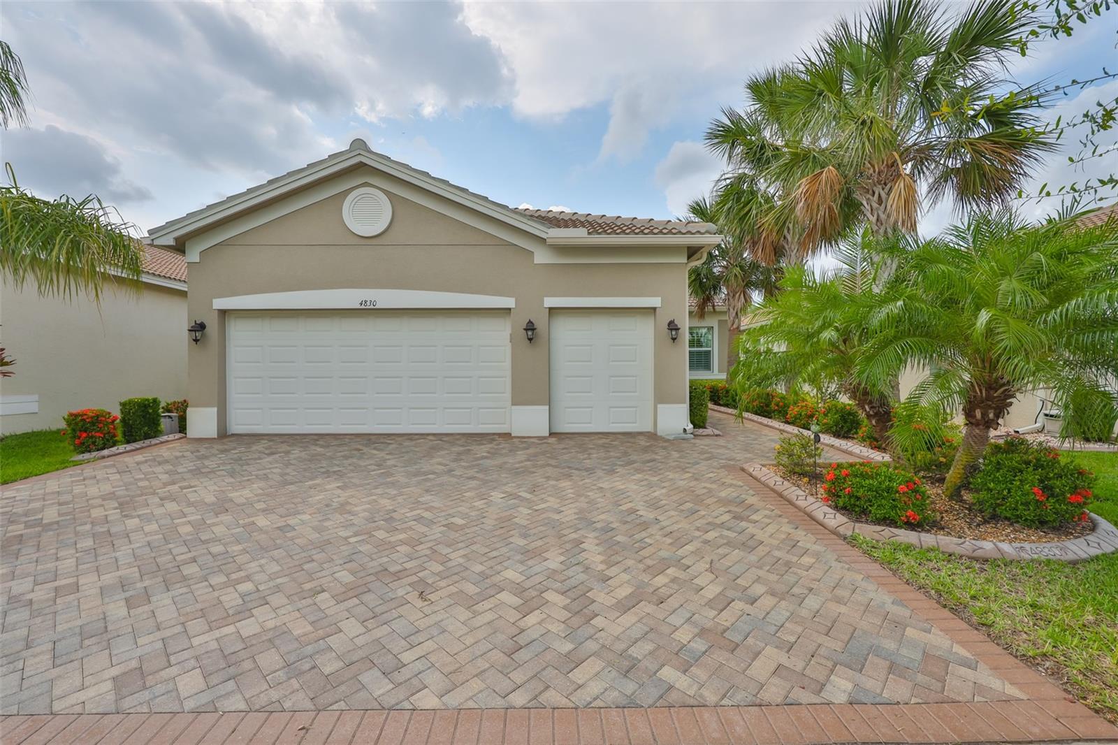 Front View From Street showing extra wide Driveway
