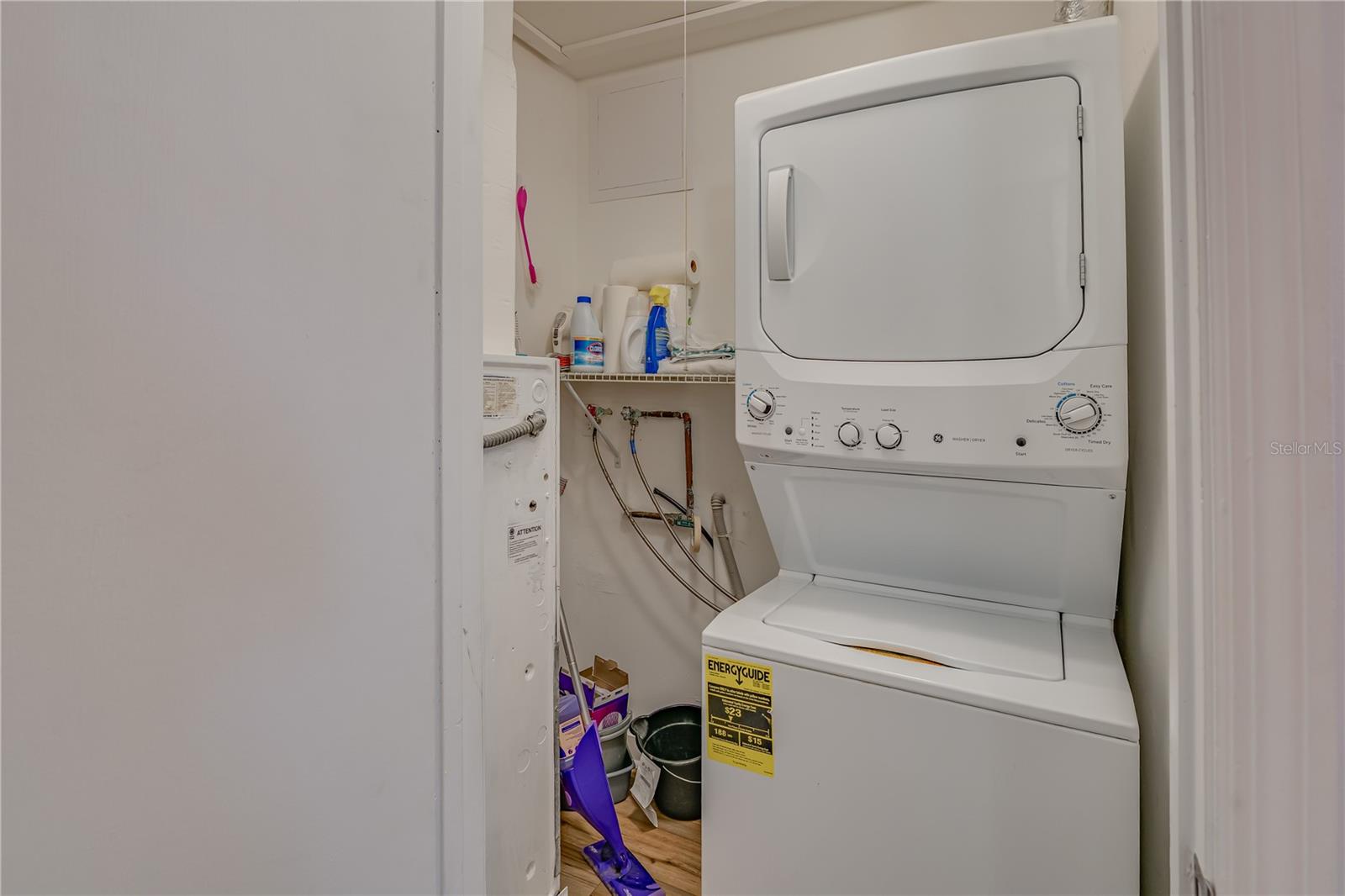 In unit utility room, washer + dryer included
