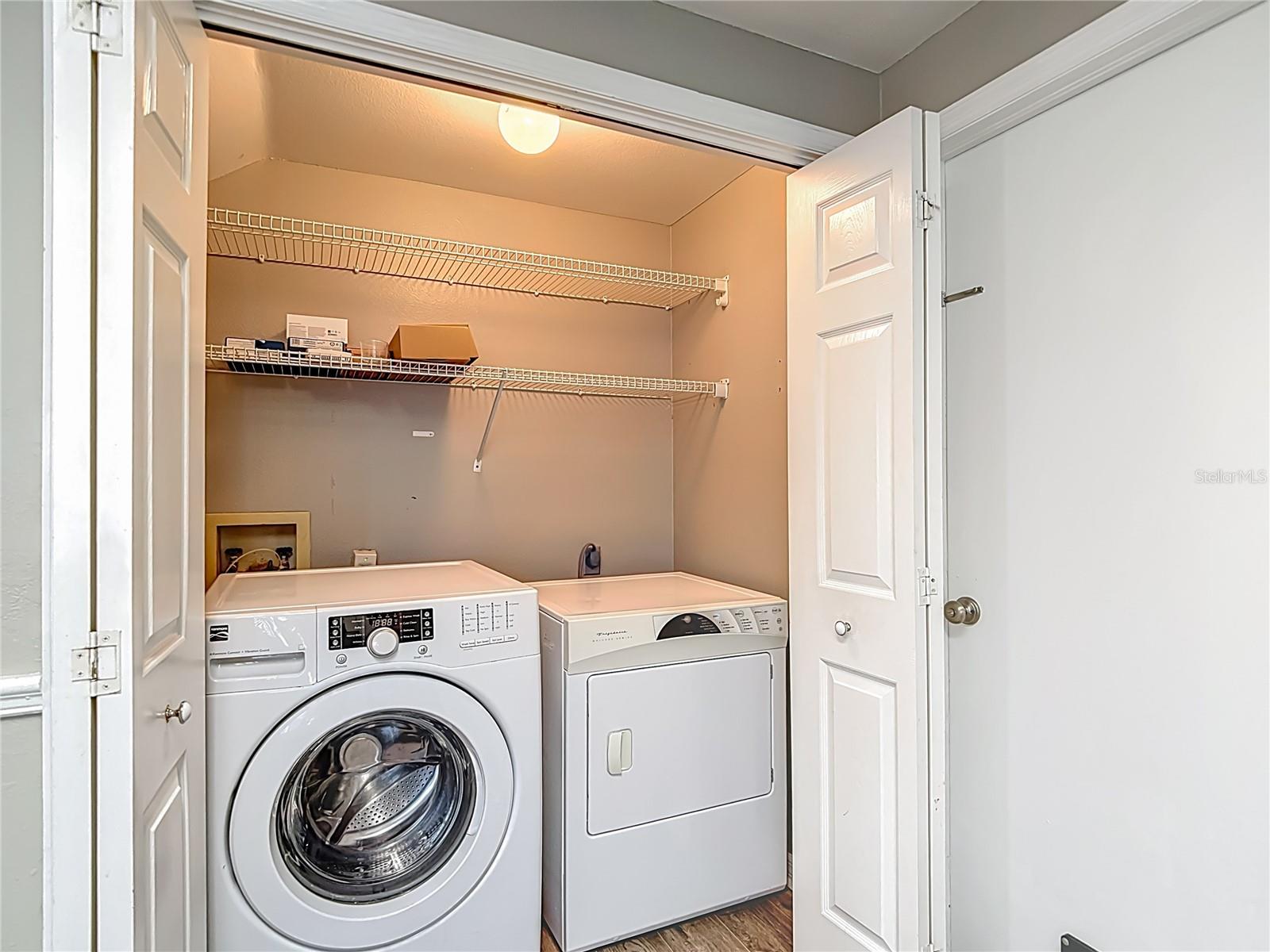 laundry closet in kitchen