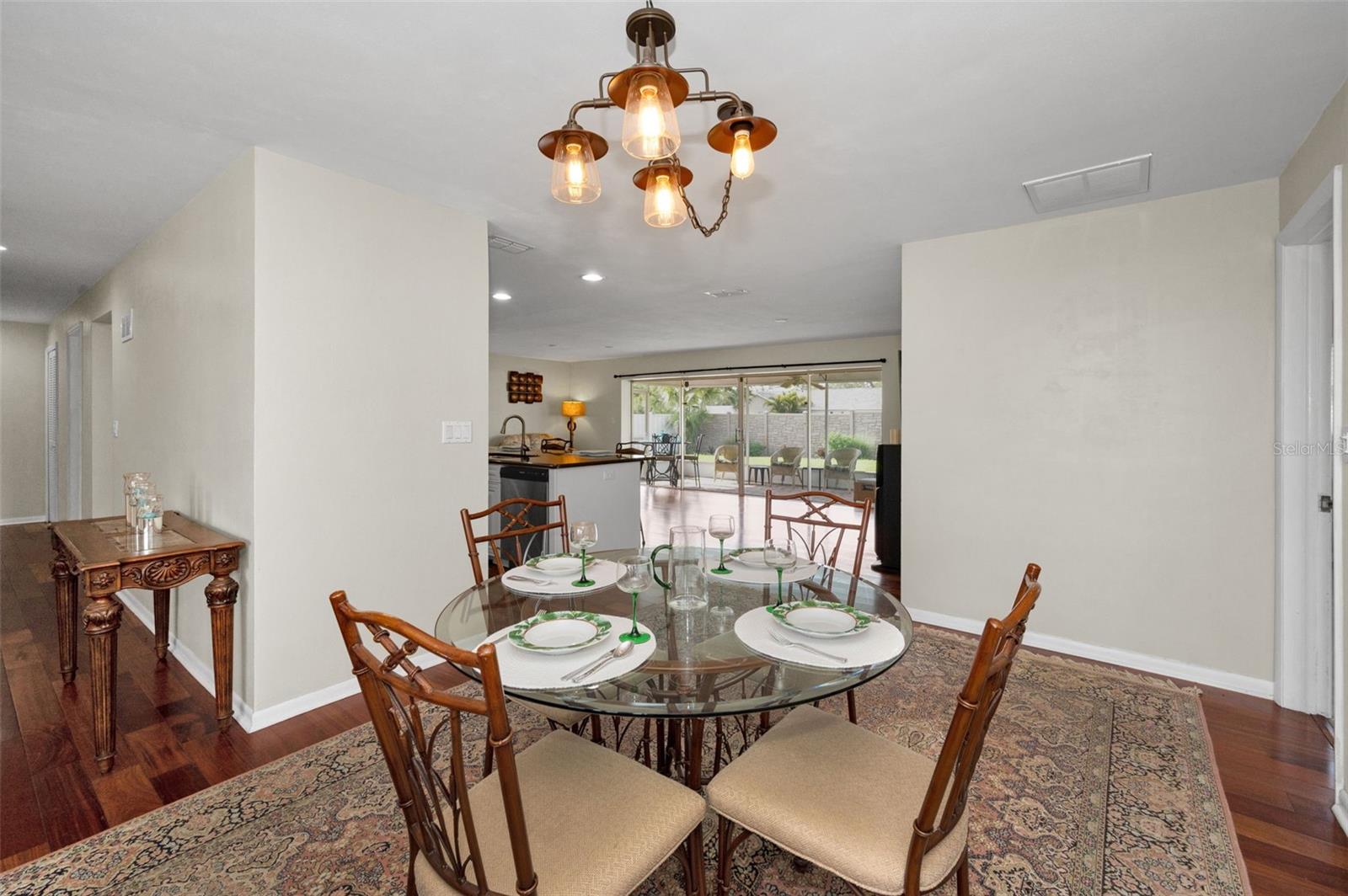 .. Dining Area Looking Towards Kitchen & Family Room.