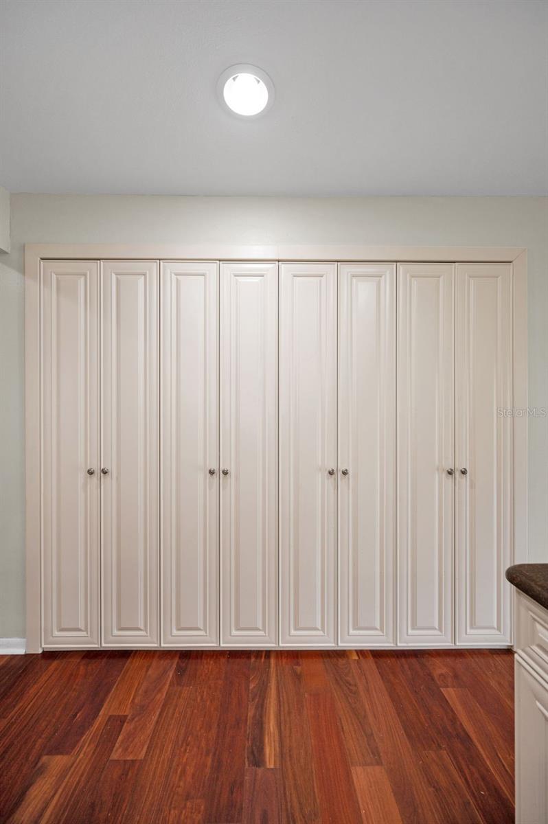 ... Wall of Additional Cabinet Space Off Kitchen..