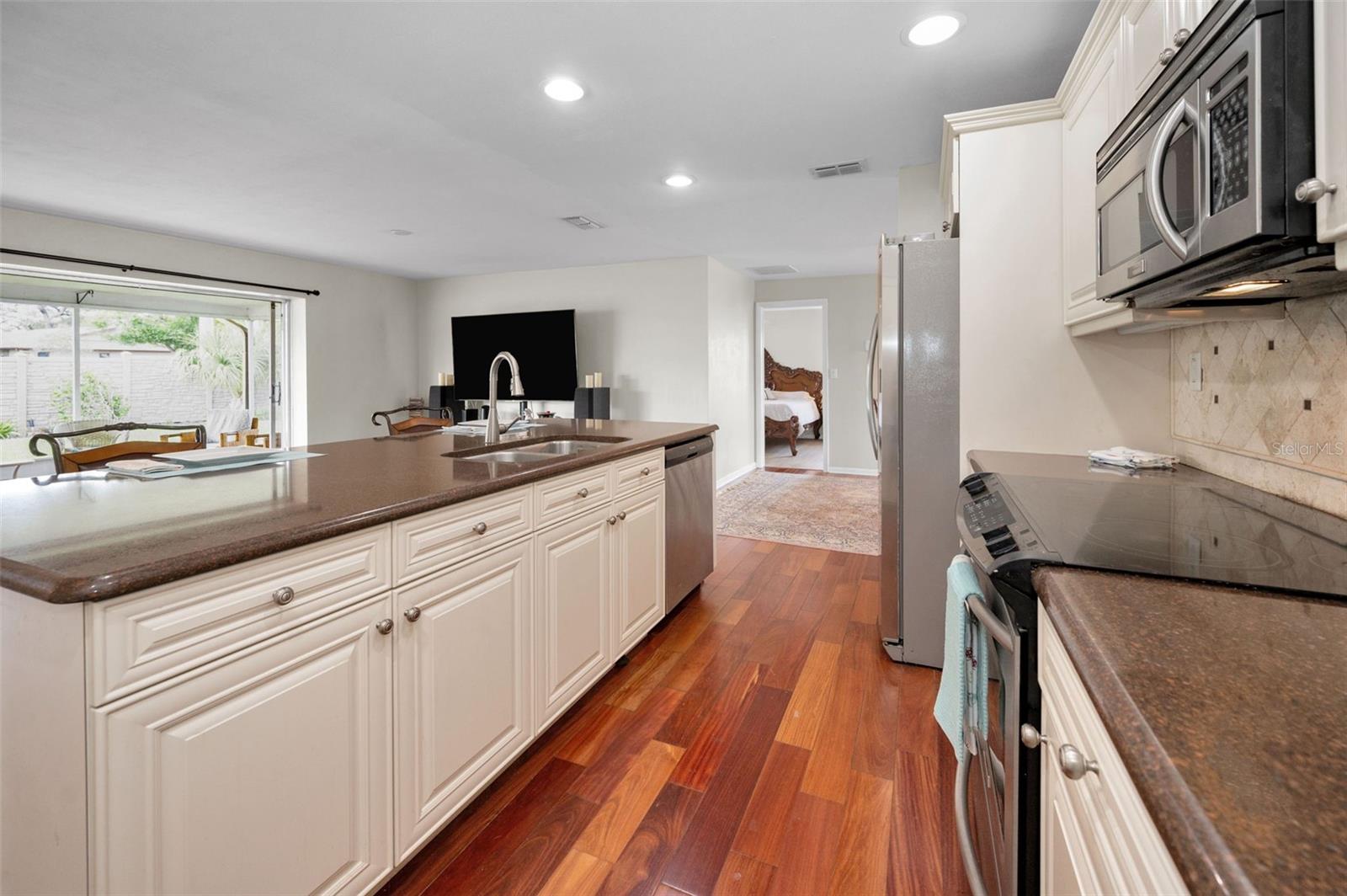 ... Kitchen Shot With Master Bedroom Suite Thru Open Door. Kitchen Shot #4..