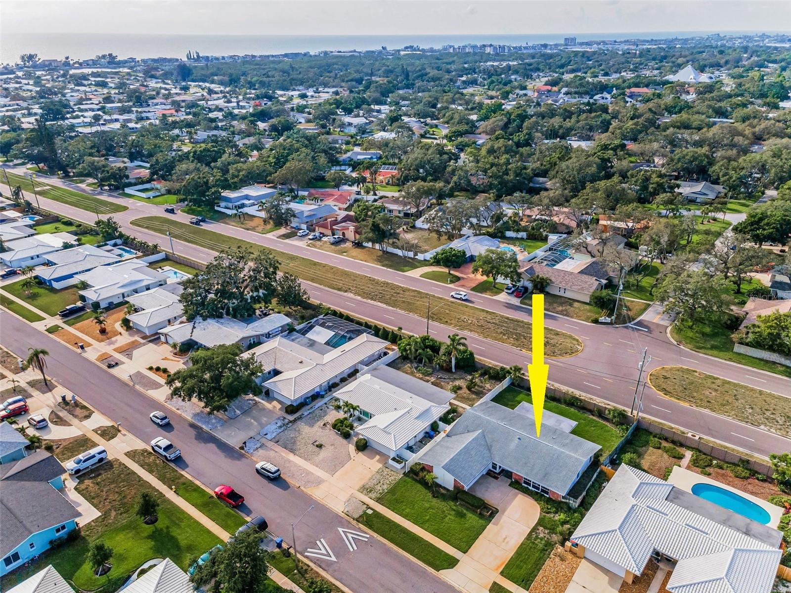.. 14341 Passage Way... Home With the Plush Green Lawn on Right in Photo. Clubhouse on Intracoastal on Left in Photo -  A Short Walk..