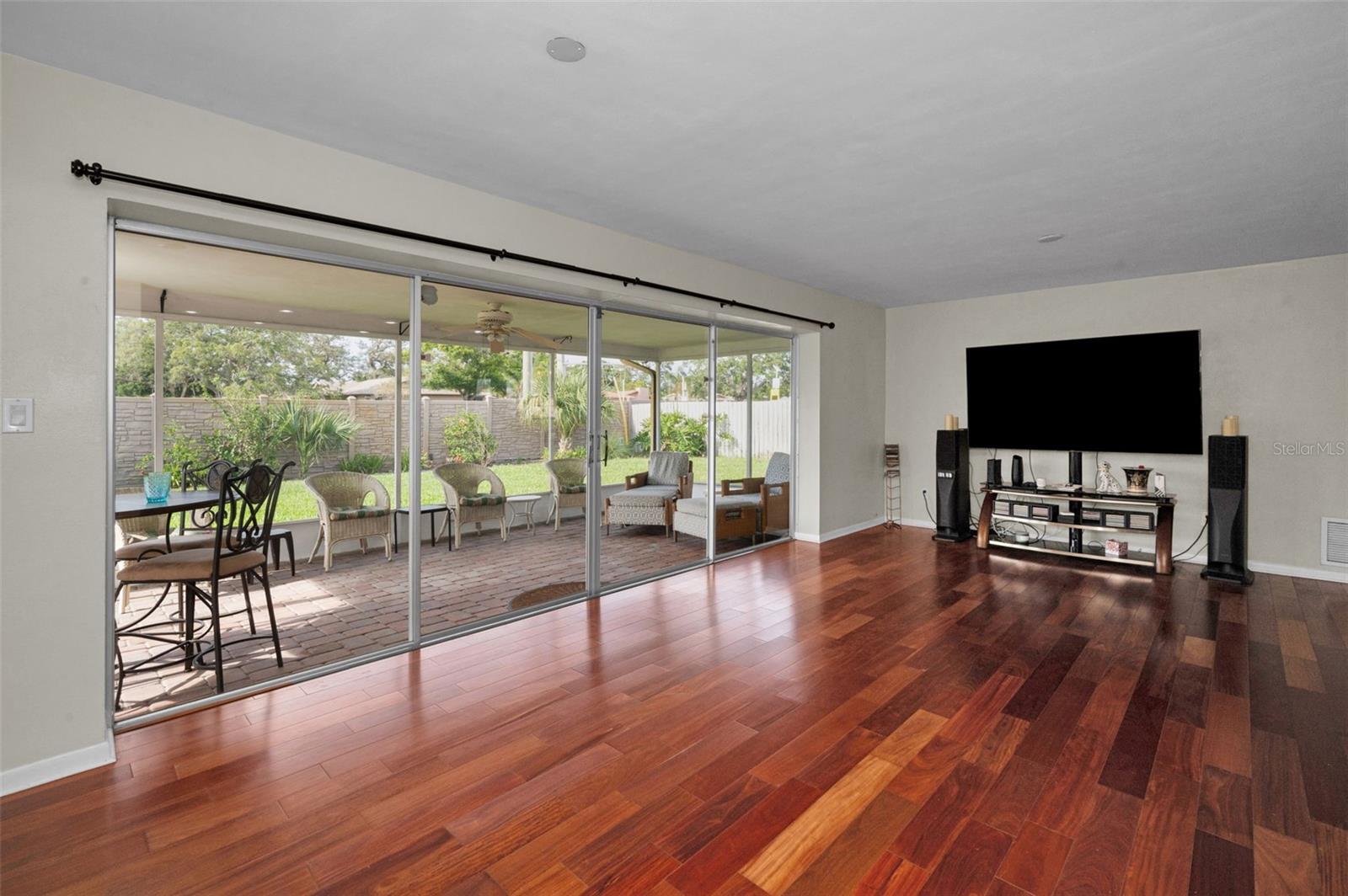 ... Family Room Looking East with Open View of Florida Room.