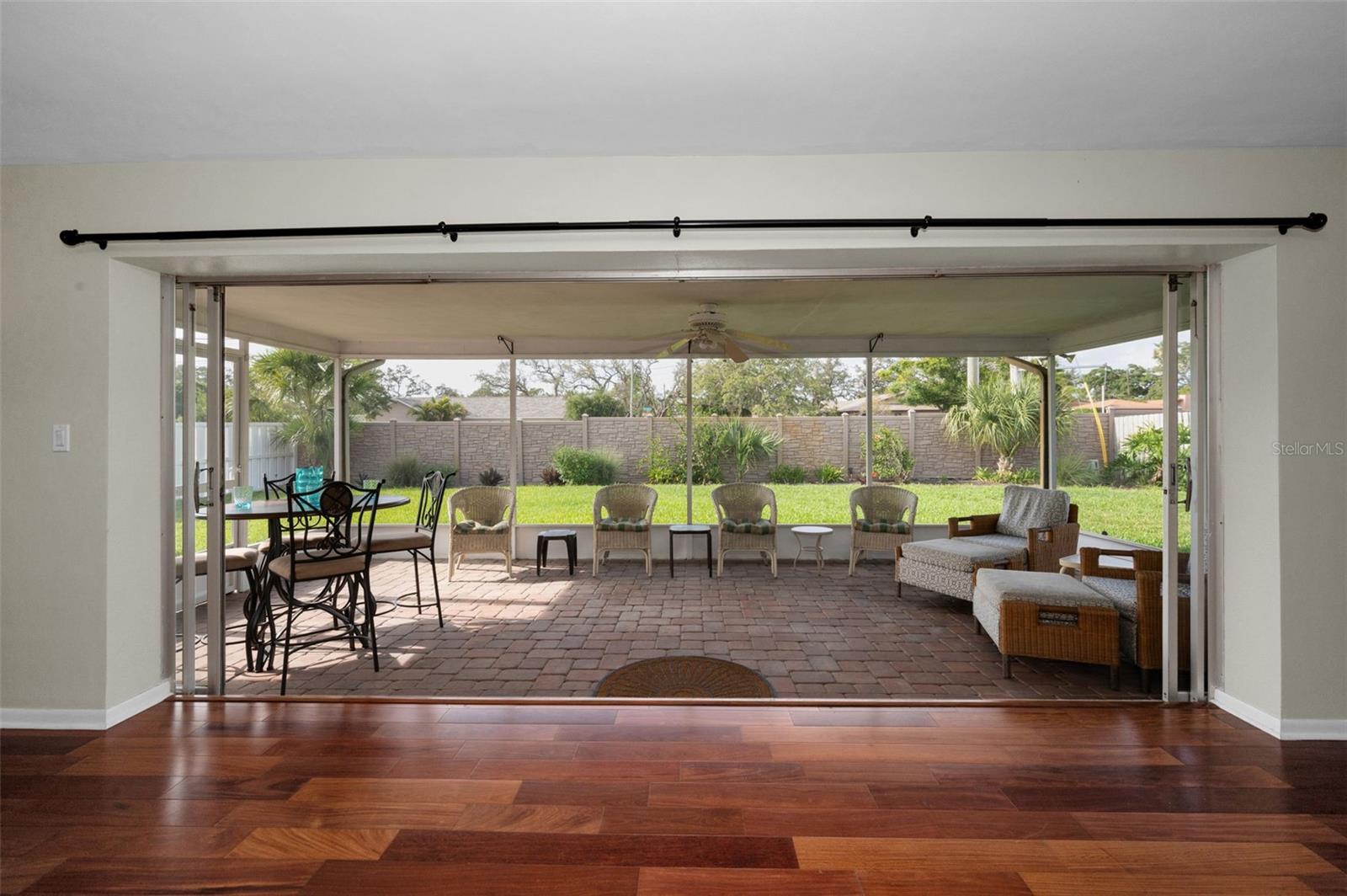 ... Large 23.5 x 10 Florida Room off the Family Room. For 6 Months a Year the Owners have doors open Enjoying Florida.. In the Summer - Doors Closed.