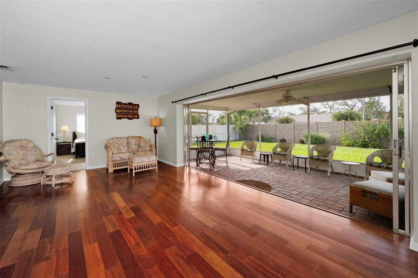 ..This is the Heart of the Home.. The Interior Space Opens to the  Large Back Yard on the  75' x 130' Lot.