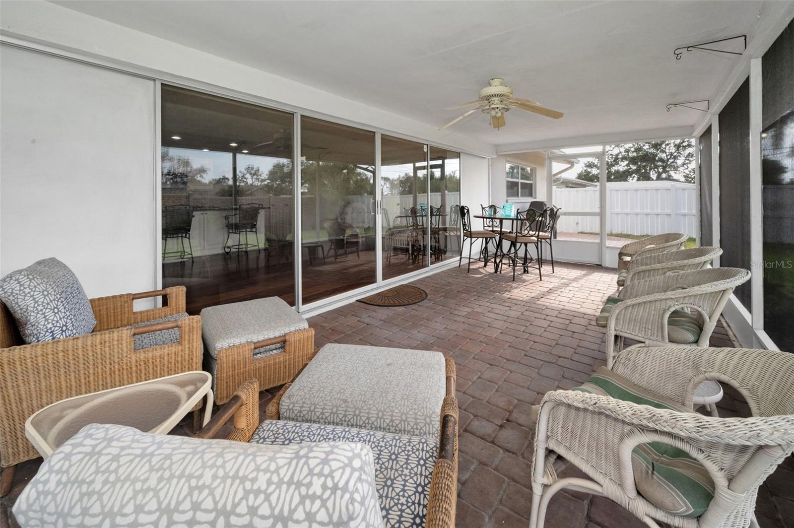 ... Large 23.5 x 10 Florida Room off the Family Room. For 6 Months a Year the Owners have doors open Enjoying Florida.. In the Summer - Doors Closed.