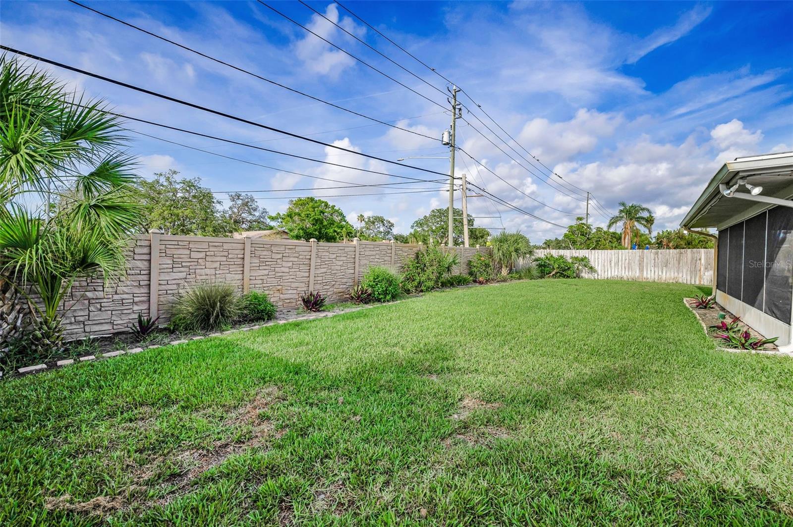 .... Large 75 x 130 Lot Size.. Photo Looking East .. Wonderful Spacious Back Yard.
