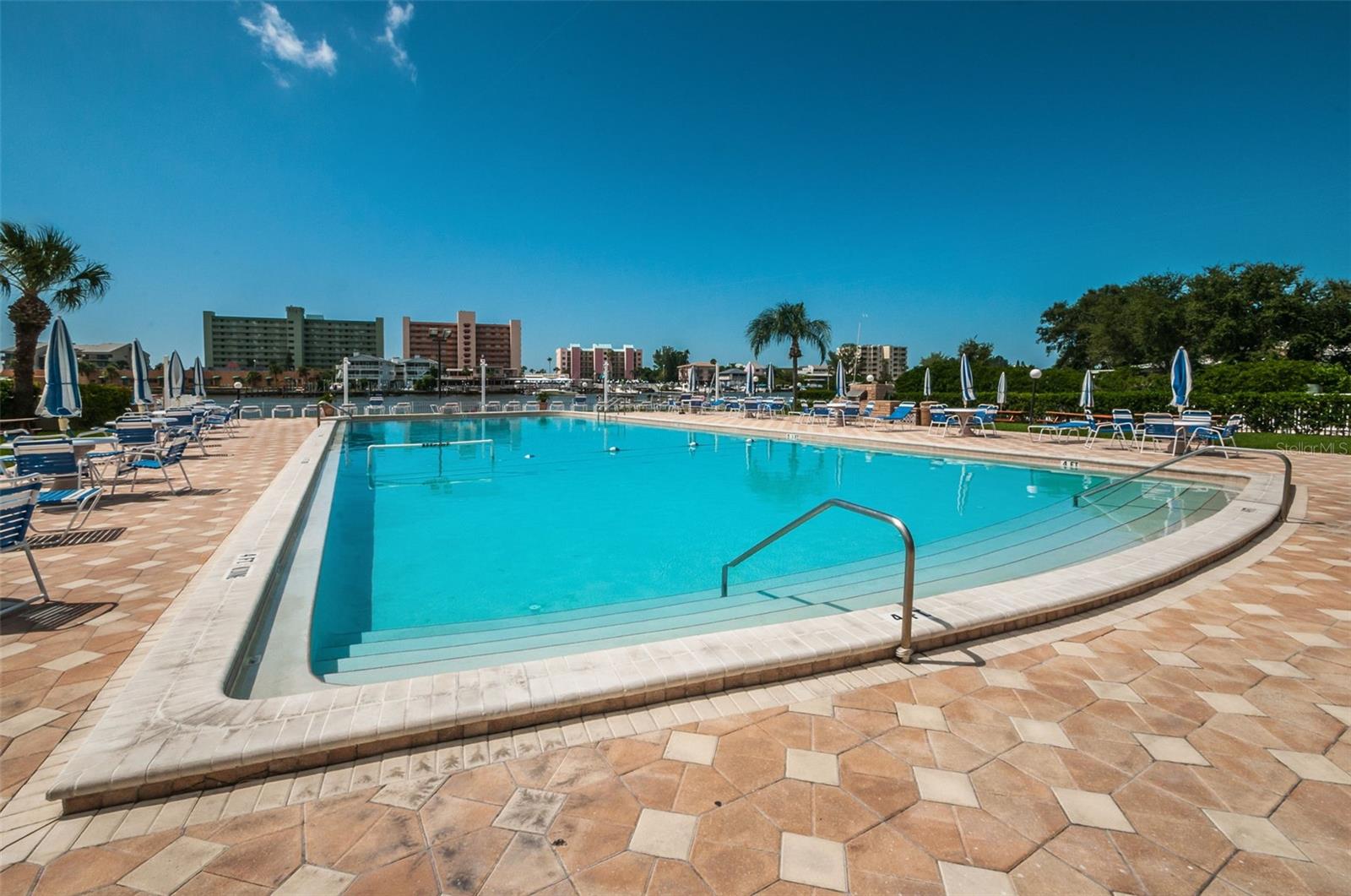 ... Plenty of Lounging Areas around the Pool. This is a Spacious Area With the Clubhouse - Fitness Center - Tennis Courts etc..