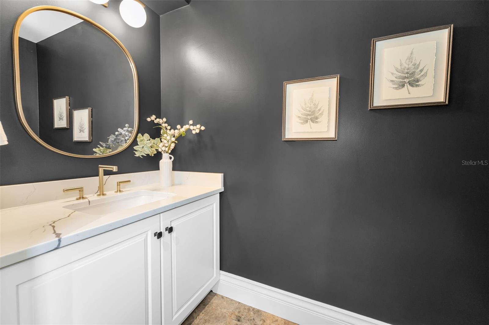 Powder Bath in the hallway near Bedrooms 4 and 5