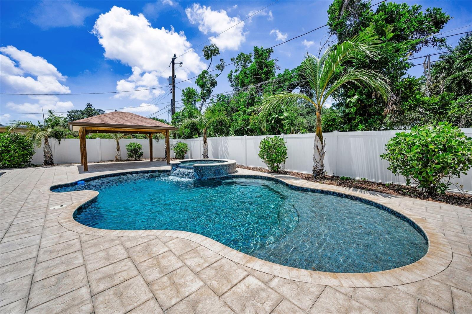 The perfect outdoor oasis for relaxing poolside or entertaining guests.