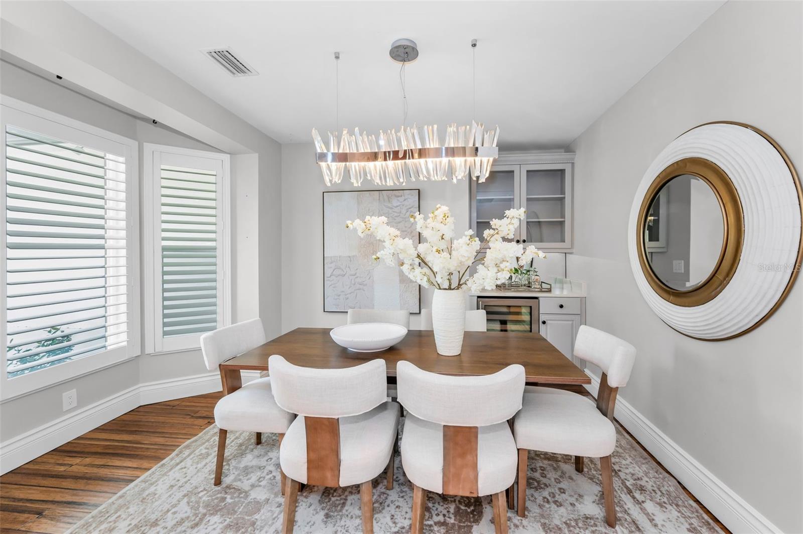 This intimate Dining Area and Bar adds charm and functionality.
