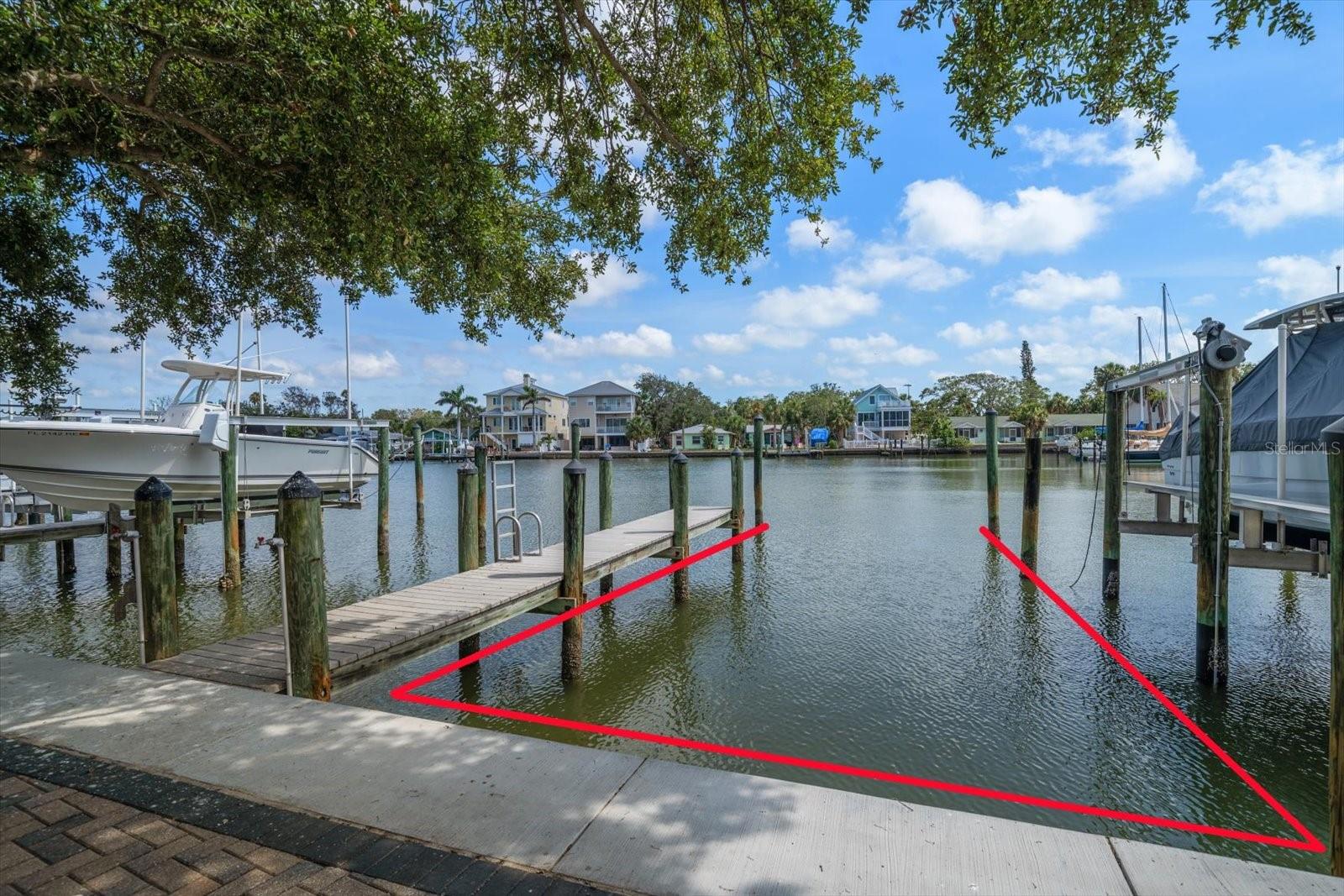 Two of two slips included with this property and located directly behind the subject property.