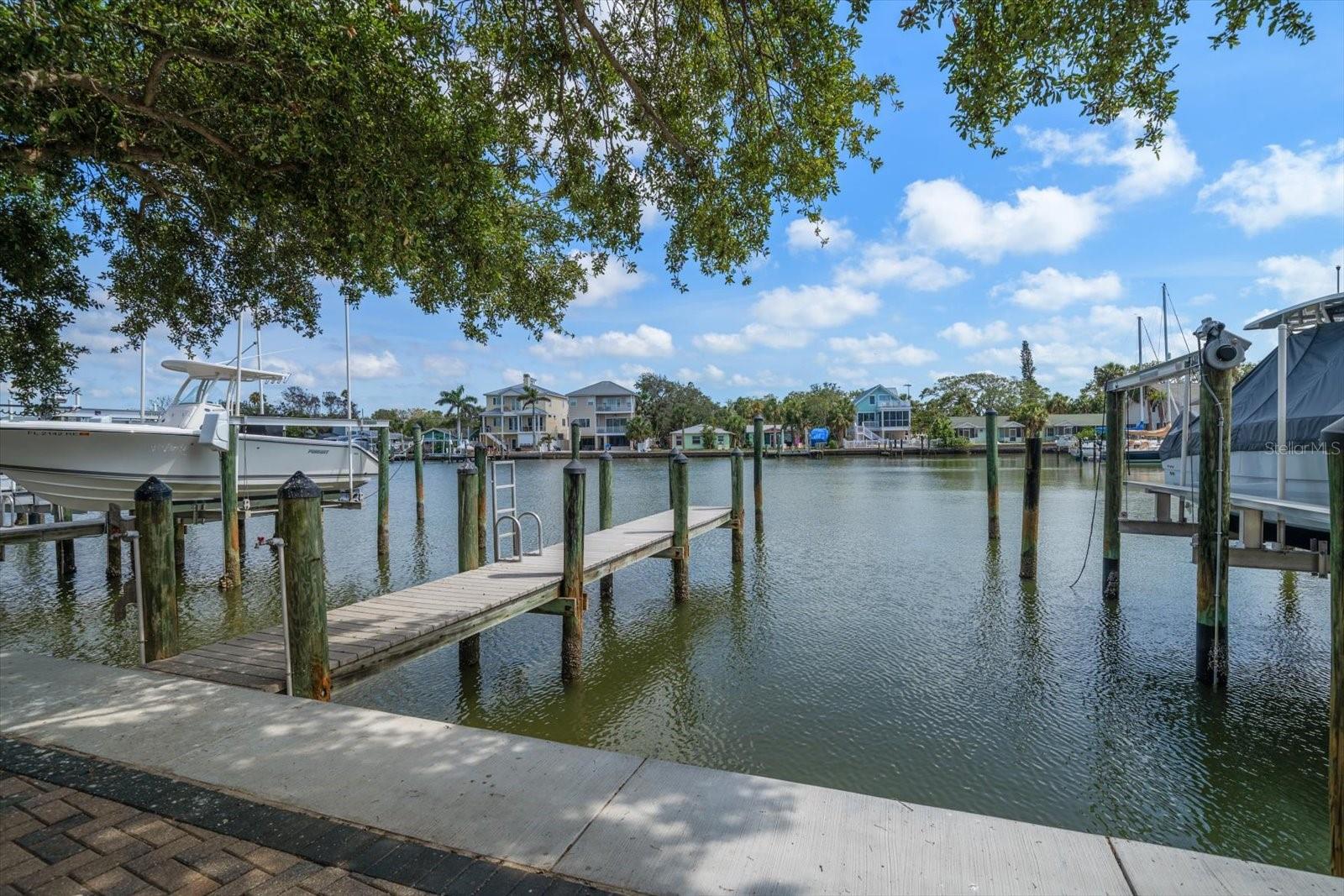 IMPRESSIVE boating with 2 boat slips assigned to this property-Attention Boat lovers!! Deep water slips for large vessels or consider adding a boat lift for smaller boats. Possibilities are wonderful!