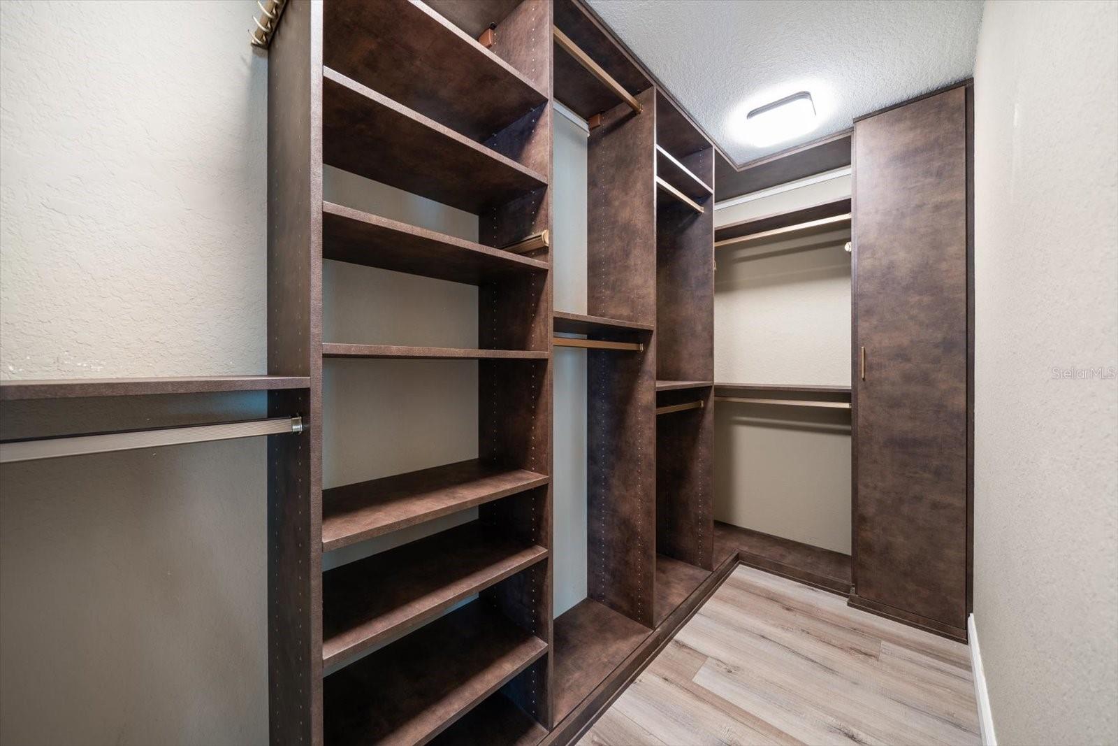 Primary bedroom walk in closet-lots of storage!